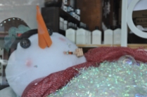 Snowman taking a bath. This was in a window display in Hot Springs, Arkansas.